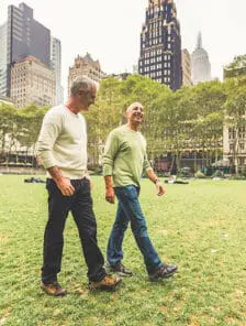 Older Couple walking through New York