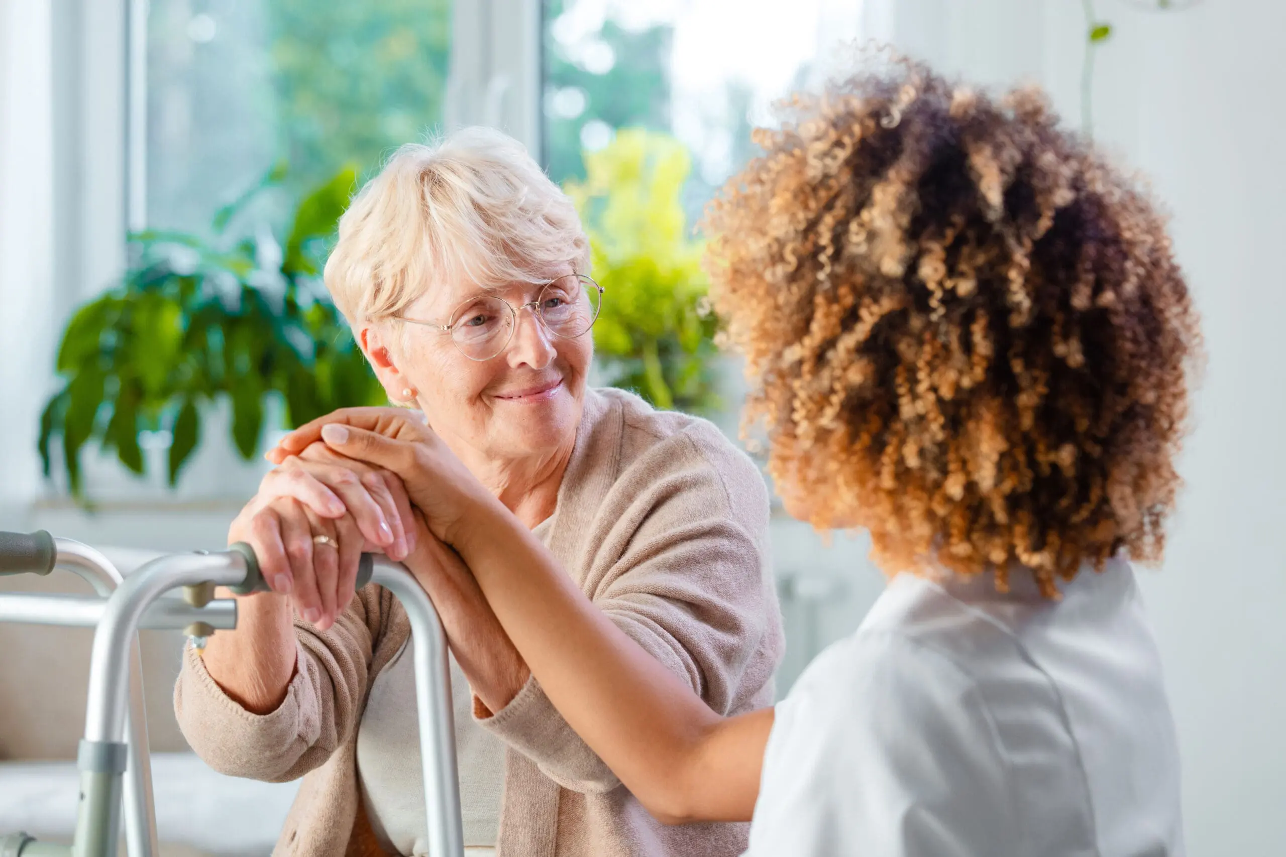 Disabled senior woman with a nurse